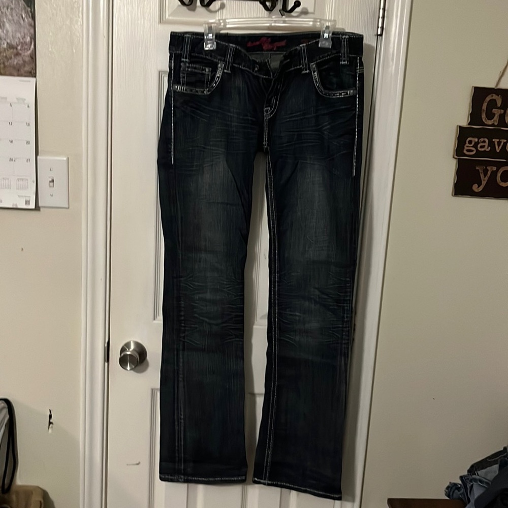Rock and roll cowgirl bootcut jeans . Size 30x34.. no rips or tears